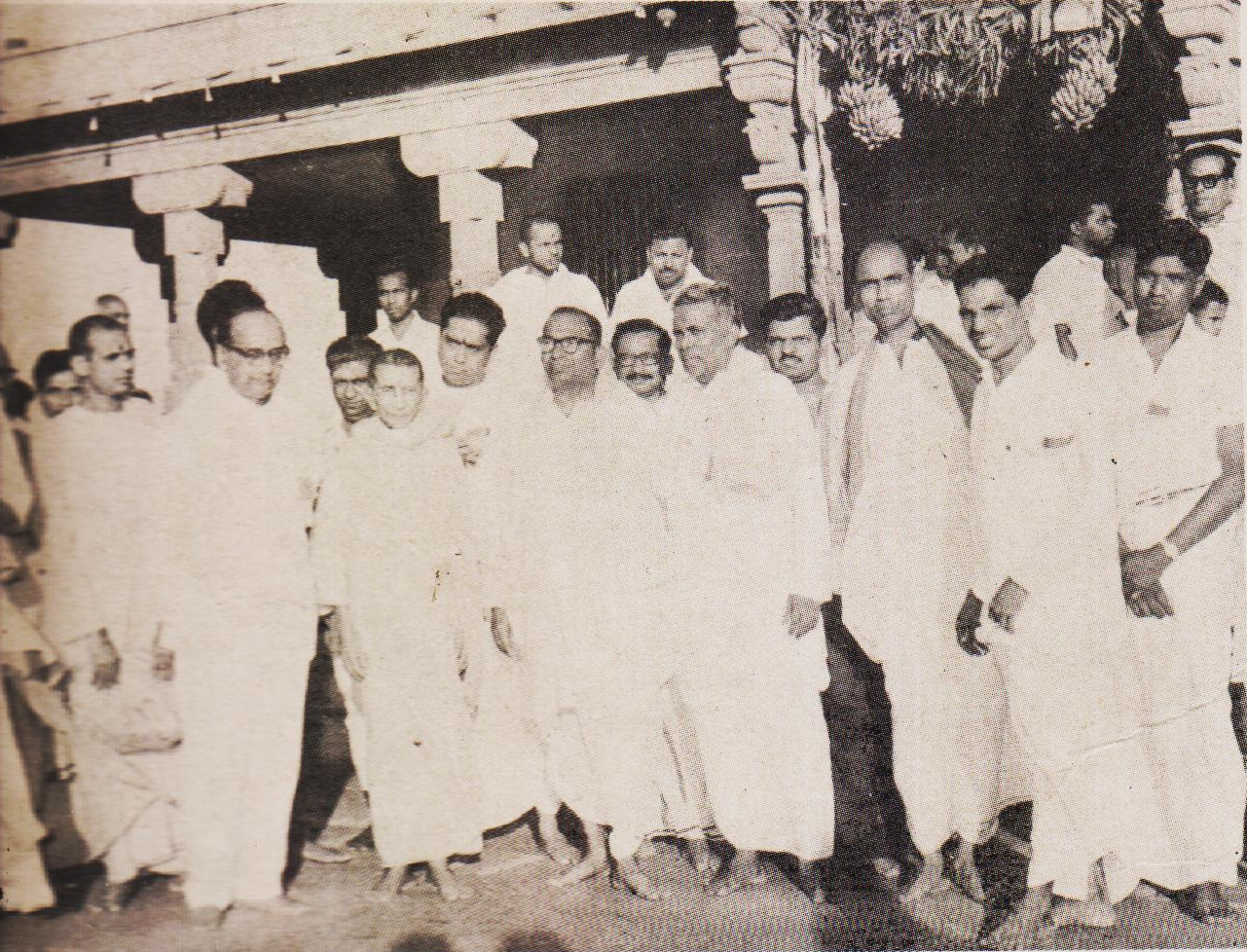 Shrimat Swami Vireswananda, President of the Ramkrishna Math and Mission, standing amidst some of the celebration-paricipants in front of the Shripada Mandapam after the Consecration Ceremony was over.