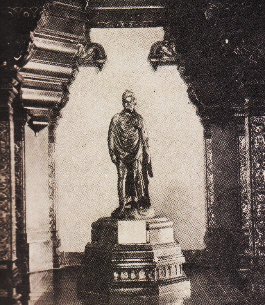 A bronze statue of Swami Vivekananda : statue height : 7'-4' Total pedestal height : 4'-8'.